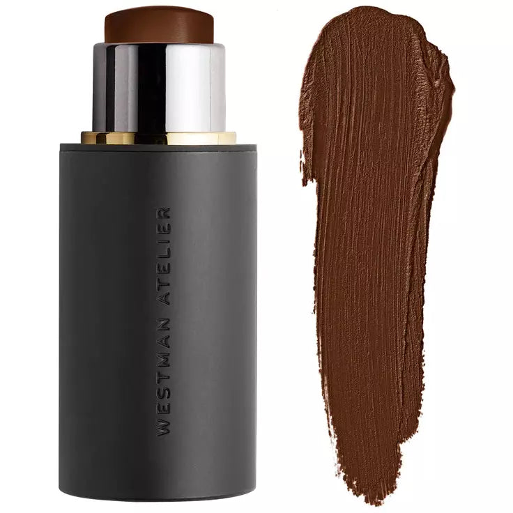 A stick foundation beside its swatch, showing the product's color and texture.