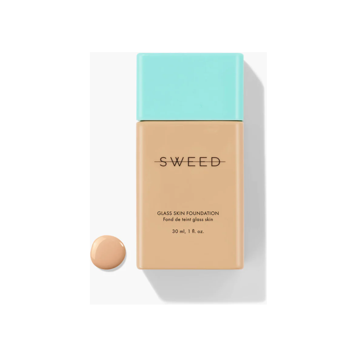 Bottle of liquid foundation with a swatch of the makeup shade displayed below it.