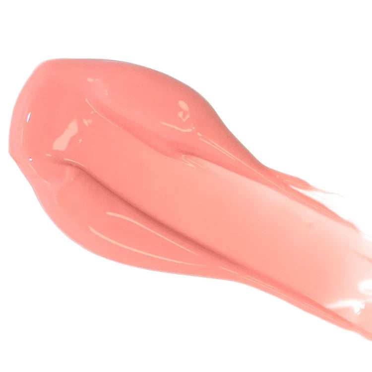 A smear of pink lip gloss against a white background.